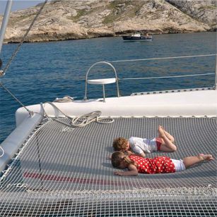 sunbath on the catamaran 